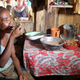 Bertine Sambetana eats clay mixed with tamarind at her home in the remote village of Fenoaivo, Madagascar.